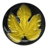 Wall plate by Pol Chambost with leaf pattern.