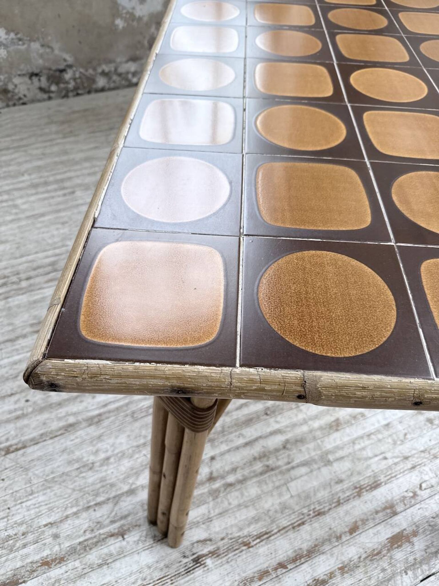1950s rattan table with ceramic top