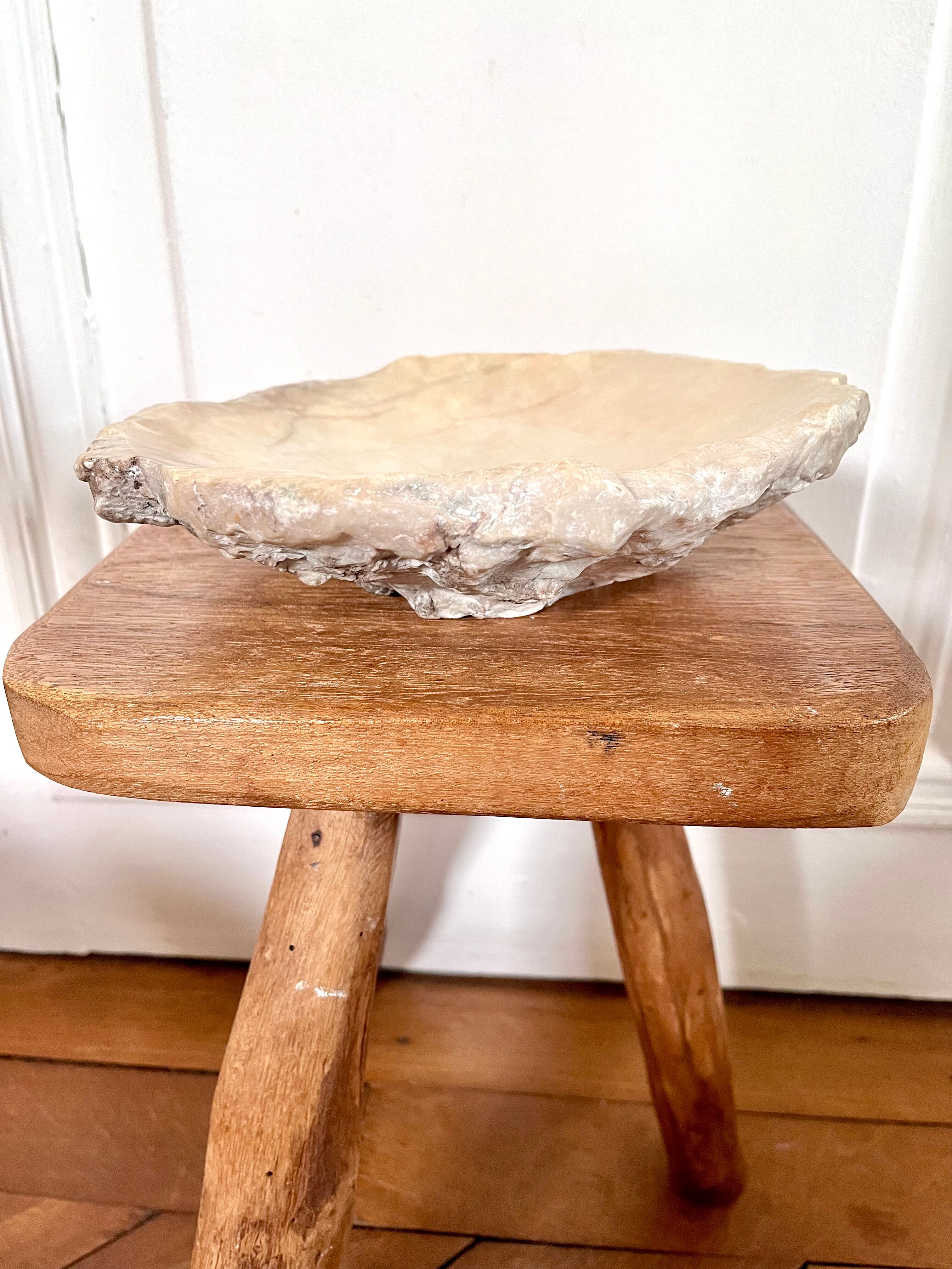Large ashtray dish made of marbled alabaster.