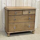 English chest of drawers in nineteenth century fir with its glass buttons
