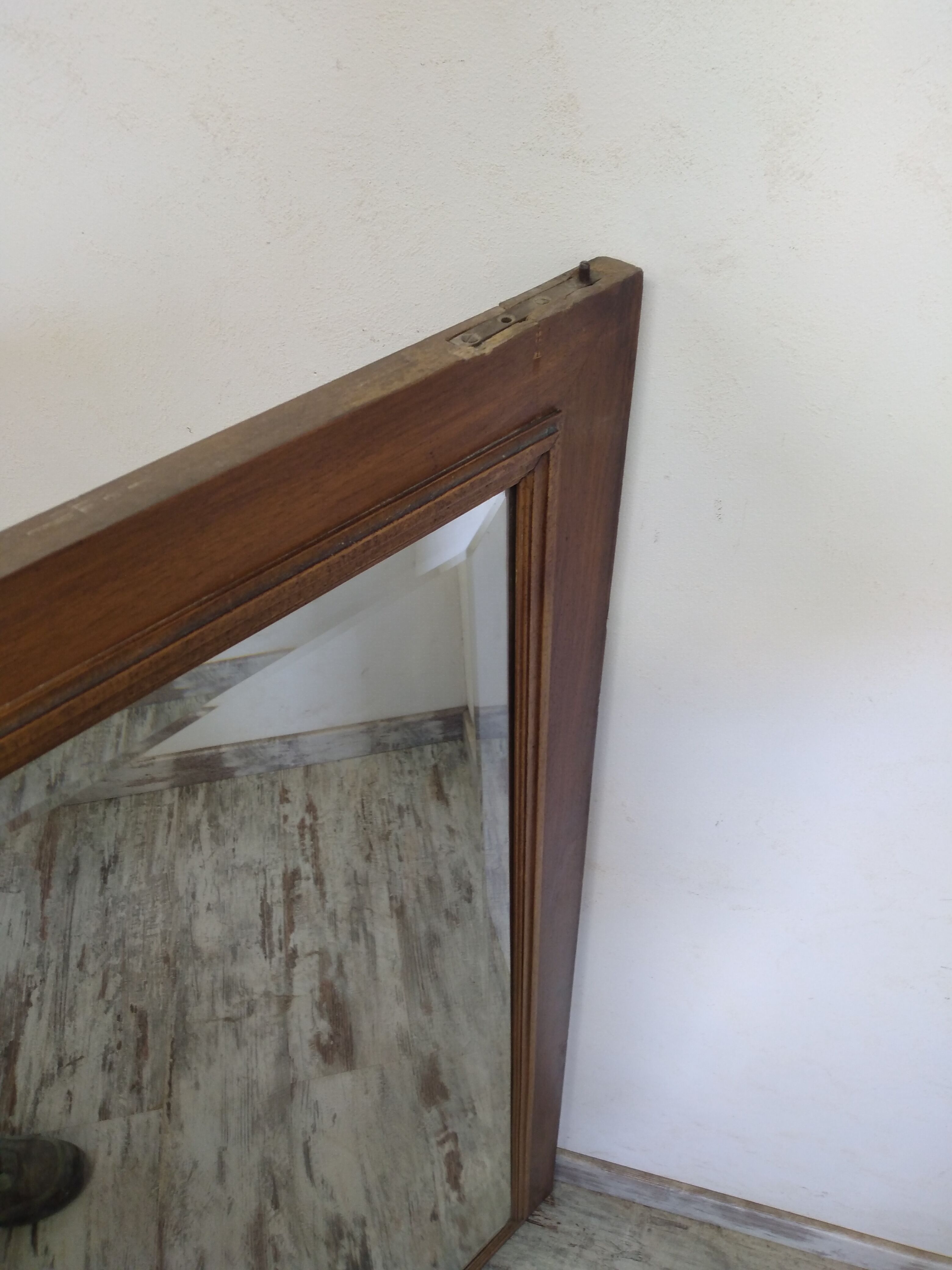 Old hosiery door with mirror