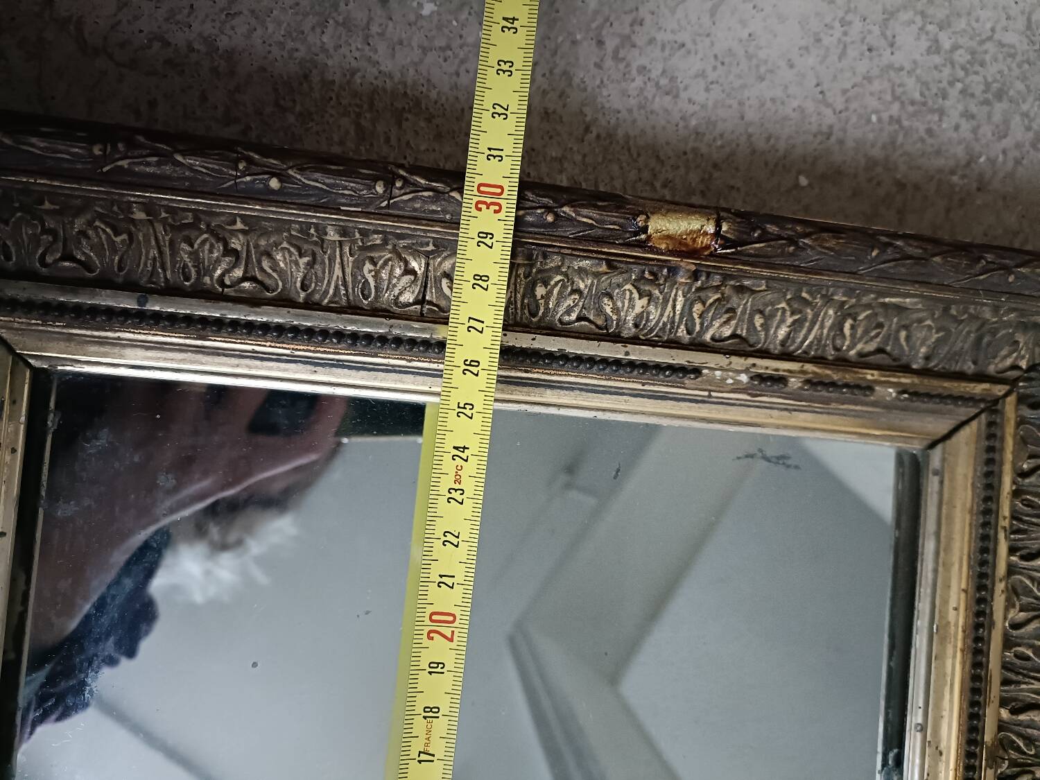 Antique mirror in wood and gilded stucco