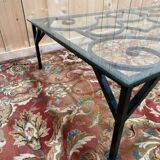 Wrought iron and glass coffee table from the 1900s.