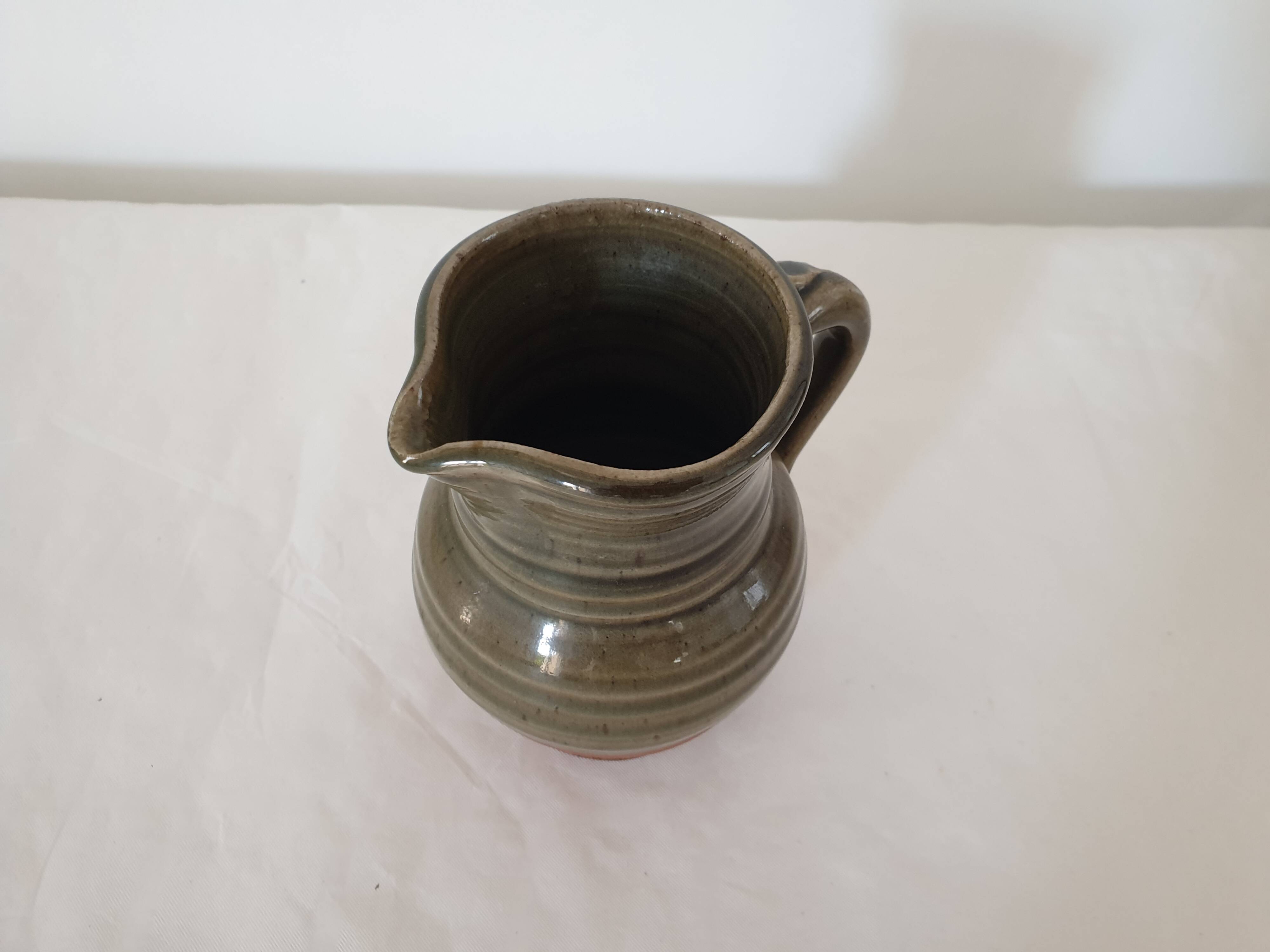 Small pitcher in glazed ceramic signed JC Seguin Puisaye (pictogram)