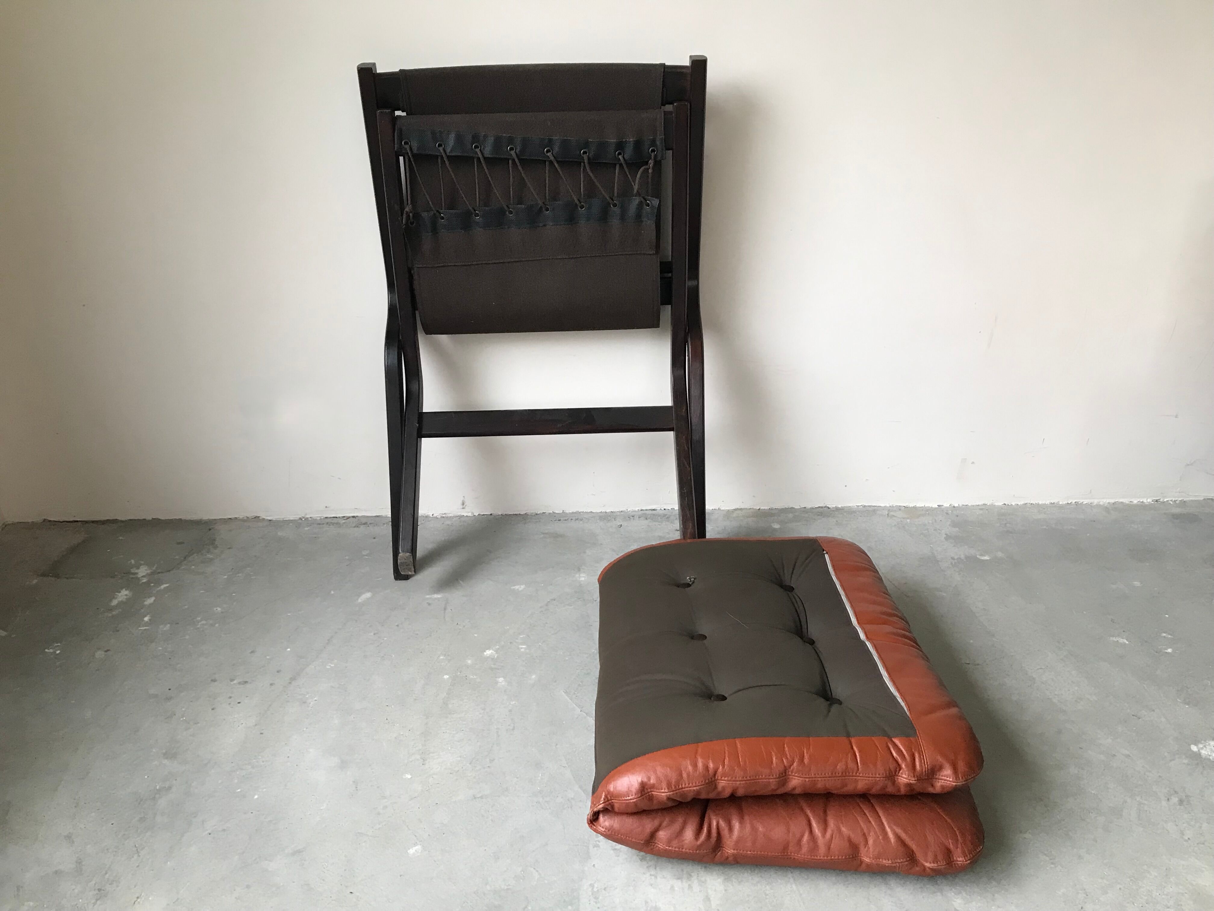 Scandinavian folding armchair in cognac leather