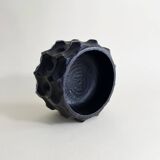 Brutalist wooden pocket emptier