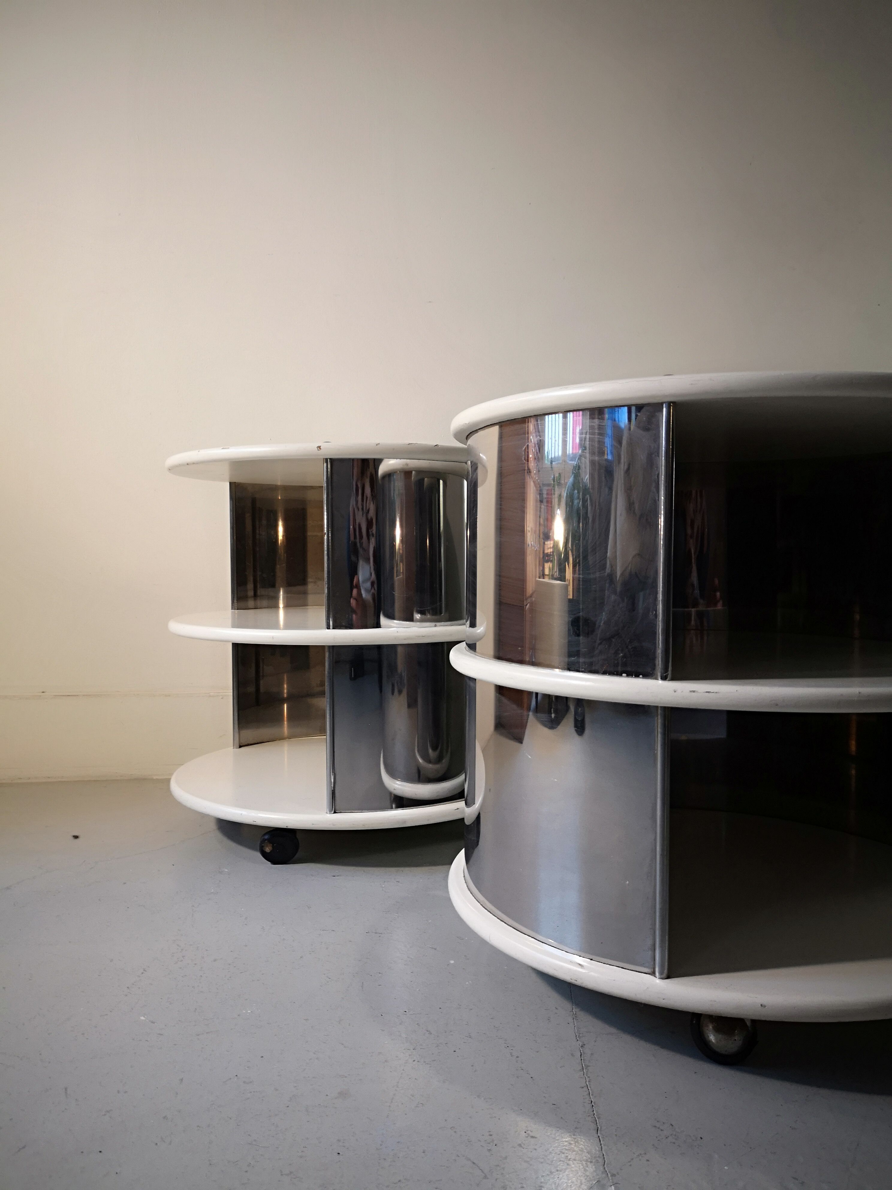 Pair of mirrored space age cylindrical bedside tables, 1960