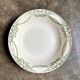 Round, deep Creil & Montereau dish in green earthenware, "Napoleon" service