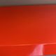 Modular red metal wall shelf in Congresso Lips Vago style.