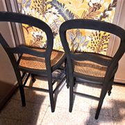 Pair of 2 chairs with cane seats in black wood, circa 1940
