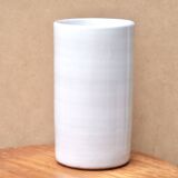 Vase by Antonio Lampecco minimalist white ceramic scroll