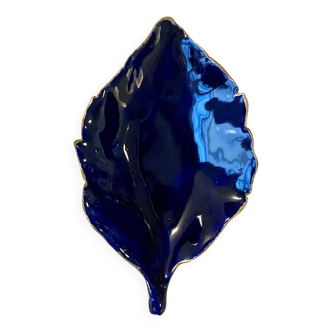 Deep blue glazed ceramic pocket emptier