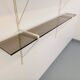 Large vintage wall shelf in smoked glass and white metal in String style.
