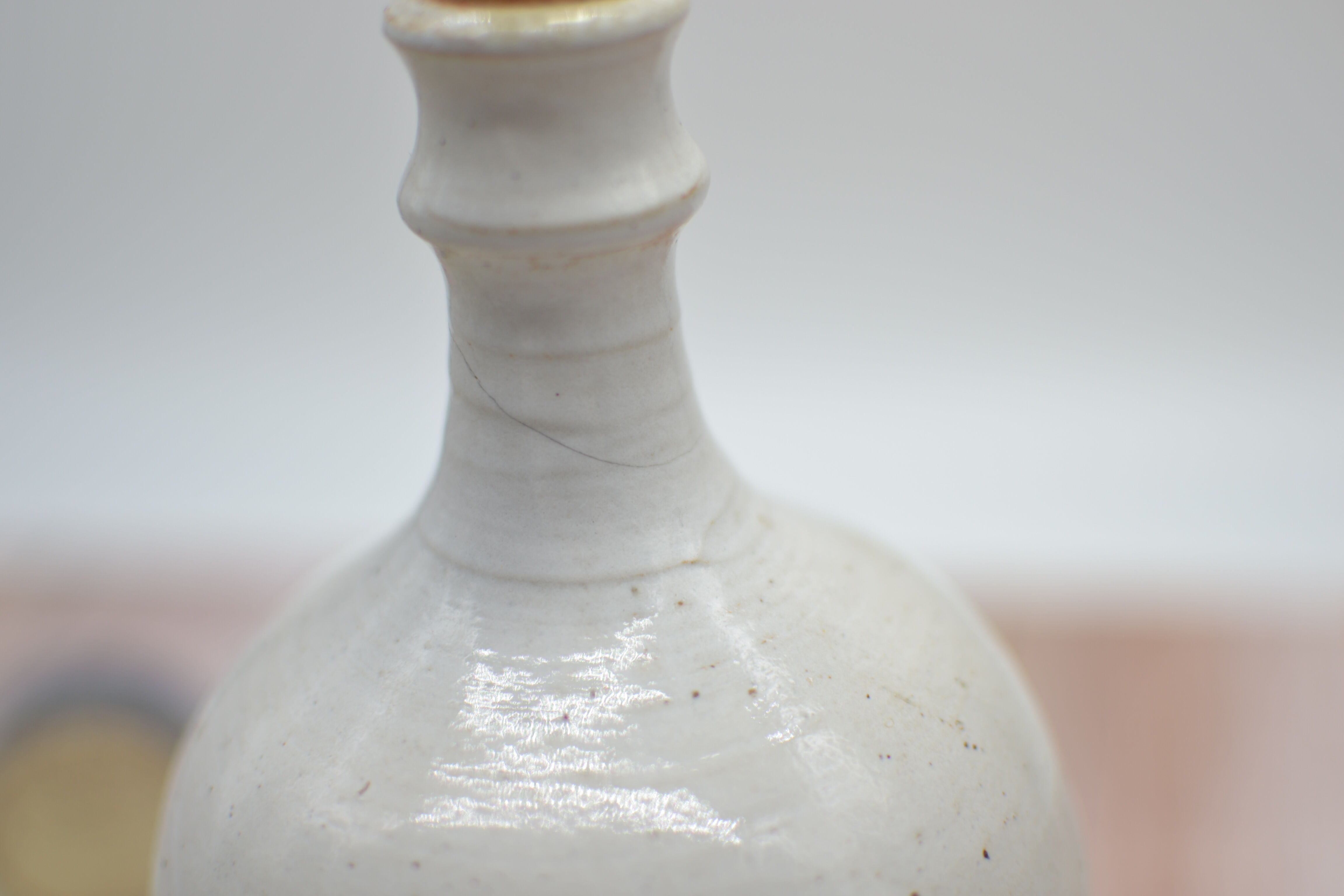 Vintage plum stoneware bottle