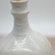Vintage stoneware bottle in plum