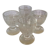 Four old molded glass shells