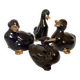 Four little black and golden ducks.