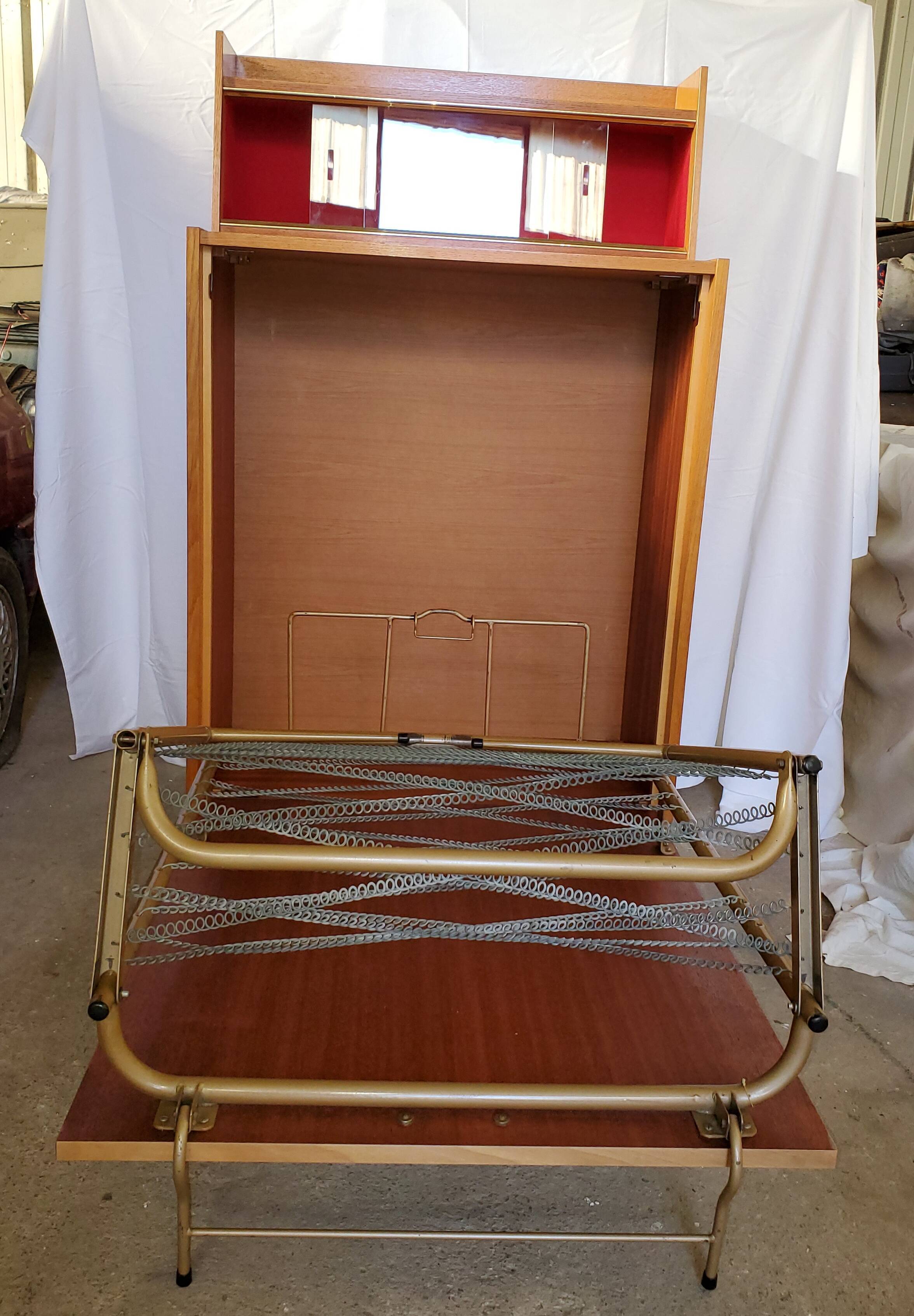 Fold bed in a 60's cabinet