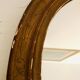Old art deco oval wooden mirror