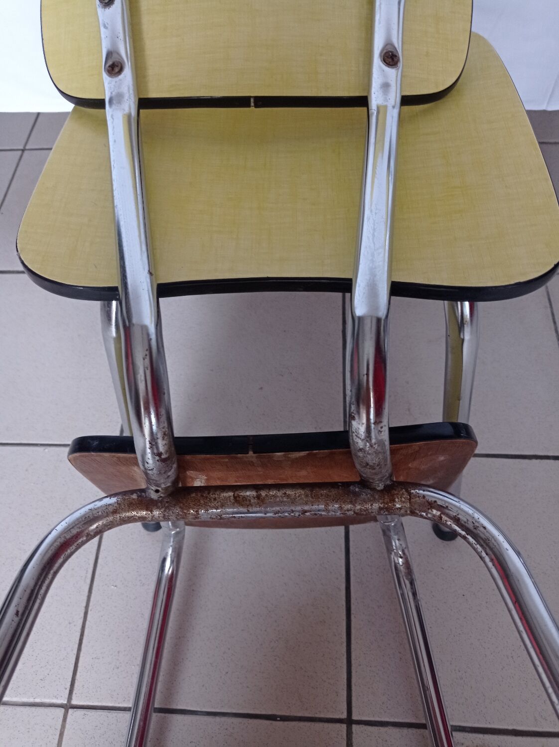 4 yellow Formica chairs