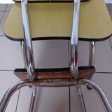 4 yellow Formica chairs