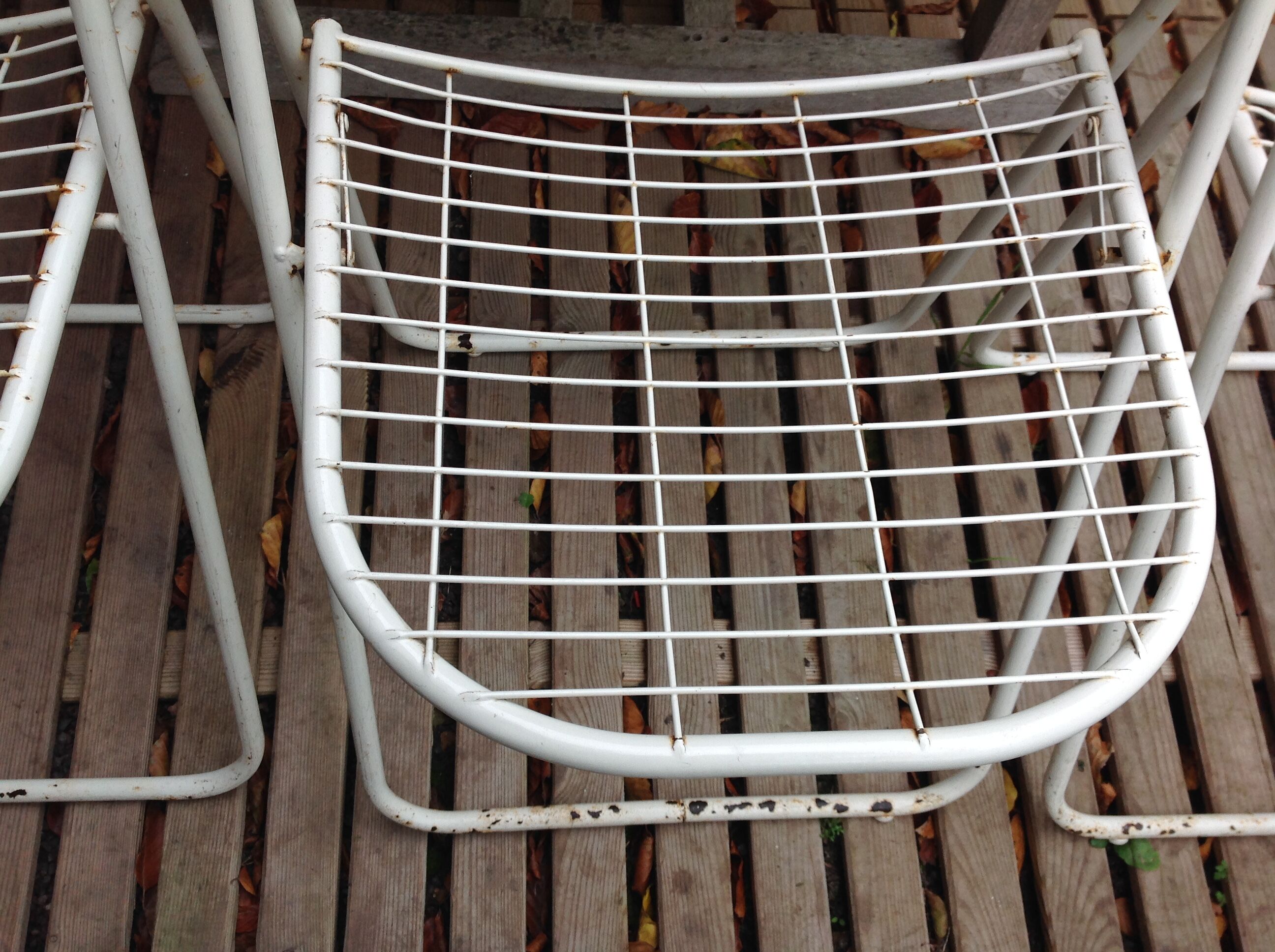 Trio of folding metal chairs