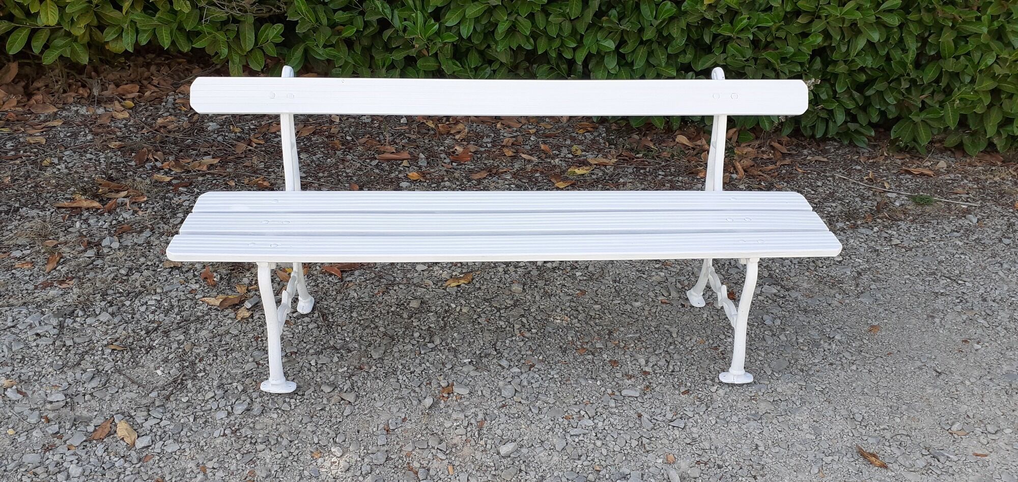 Old white garden bench cast iron feet 19th century