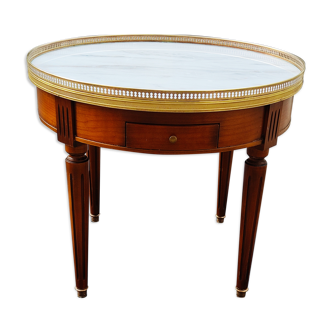 French hot water bottle table in Louis XVI style (1890); marble top and bronze gallery