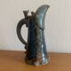 Antique Art Nouveau enamelled stoneware carafe