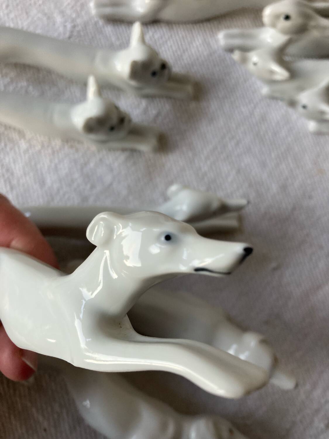 12 Art Deco porcelain knife holders