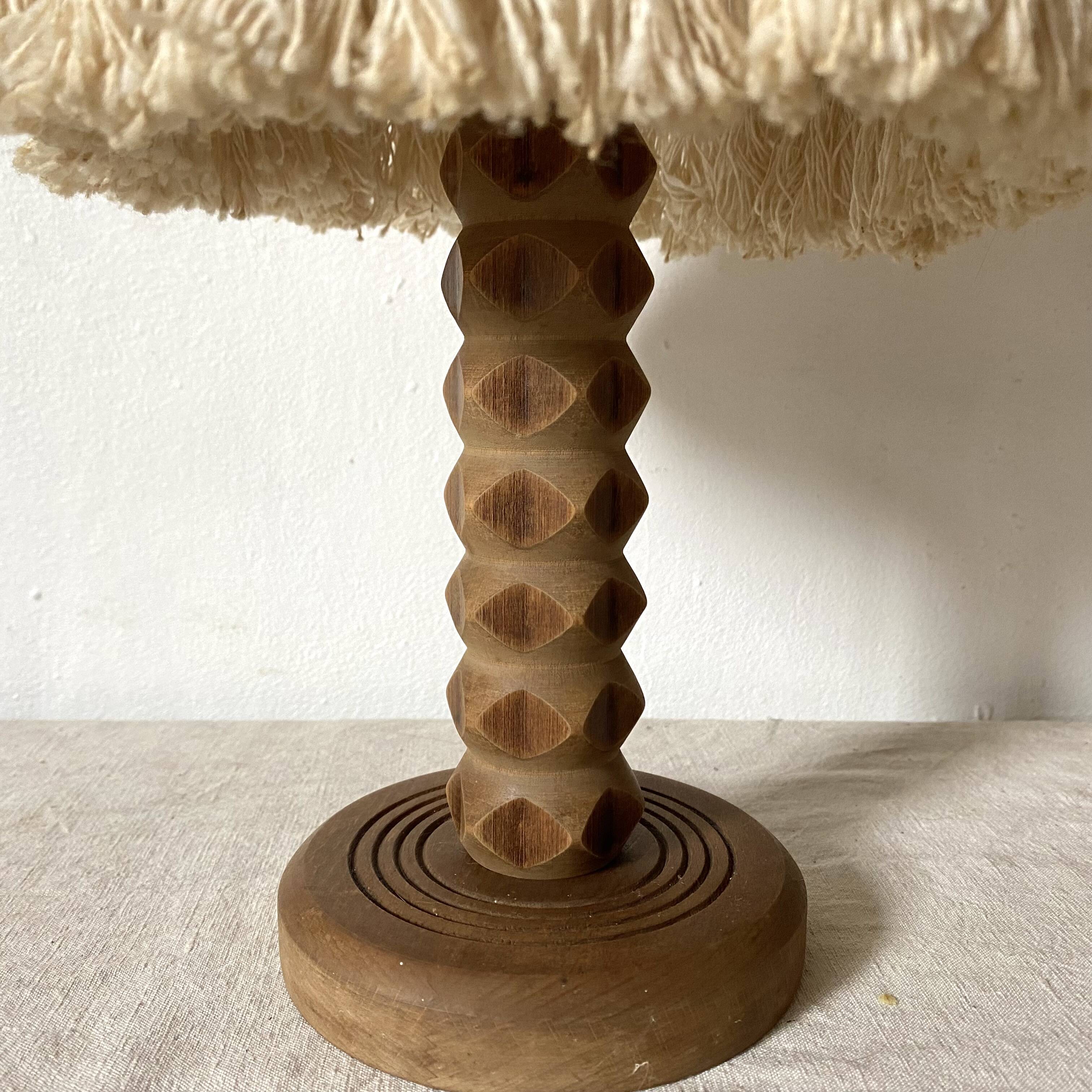 Pair of carved wood and macramé bedside lamps