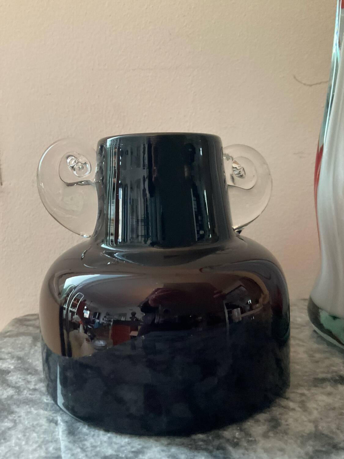 Two vintage ear vases made of Murano glass.