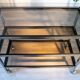 ERARD console (France), black metal and smoked glass side table, 1980.