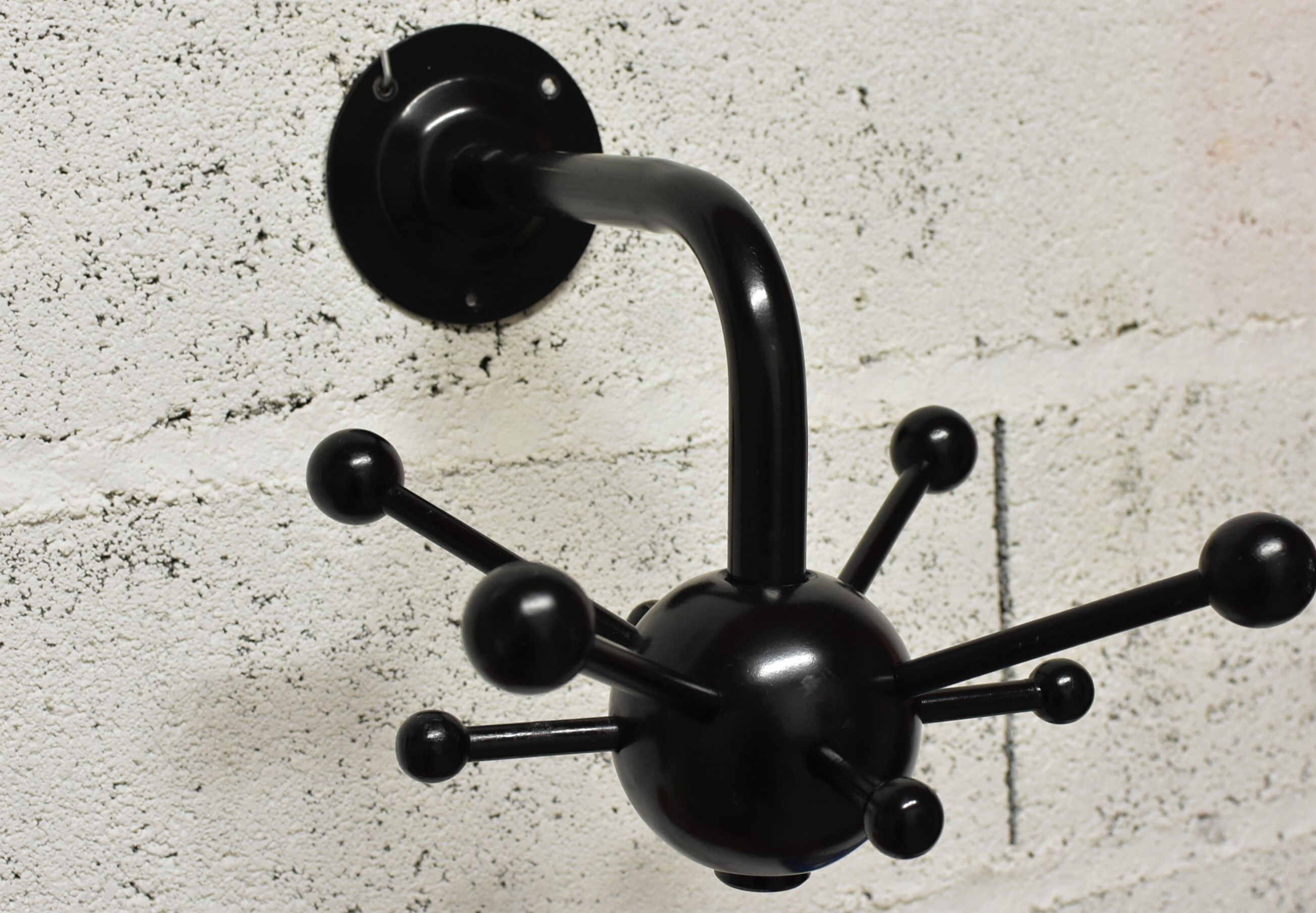 Black sputnik coat rack