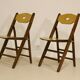 Pair of vintage folding chairs year 50 sculpted backrest.