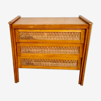 Modernist vintage chest of drawers in light chene has 3 drawers rattan top changing table