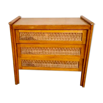 Modernist vintage chest of drawers in light chene has 3 drawers rattan top changing table