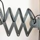 Lampe murale à ciseaux en émail noir industriel, années 1950
