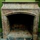 Louis XIV-style fireplace has 19th century veined pink marble hood