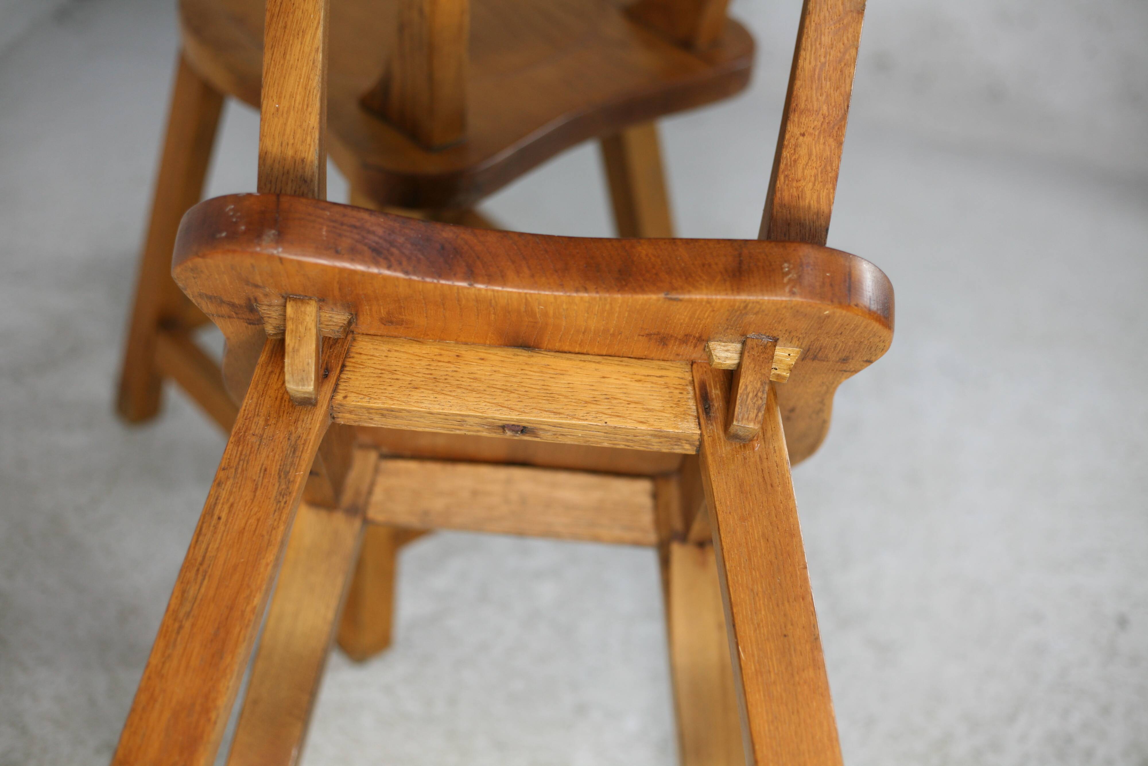 Pair of brutalist wooden back stools. France, circa 1960