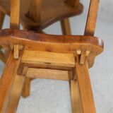 Pair of brutalist wooden back stools. France, circa 1960