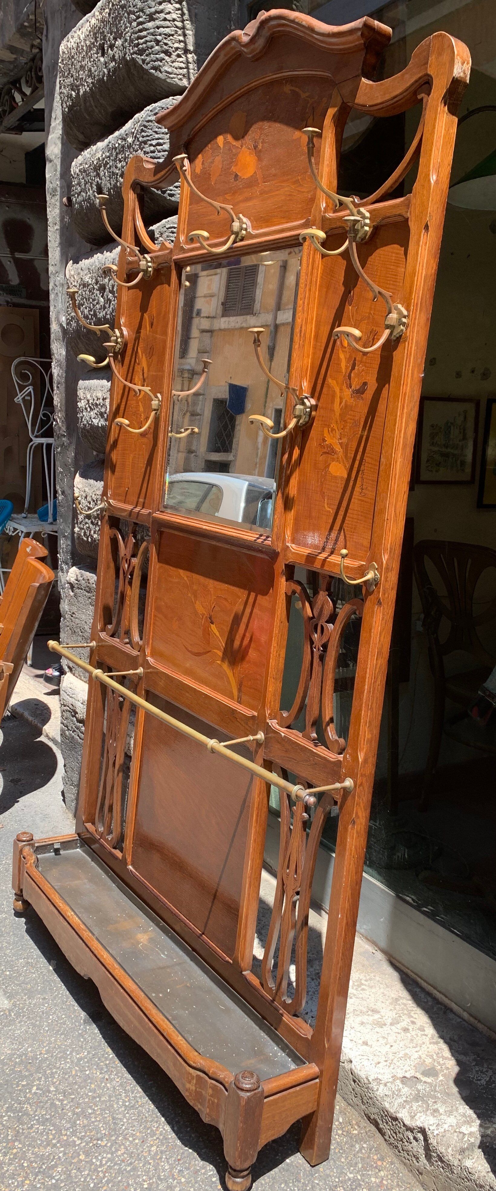 Antique french bronze, acacia, and walnut coat rack by Émile Galle