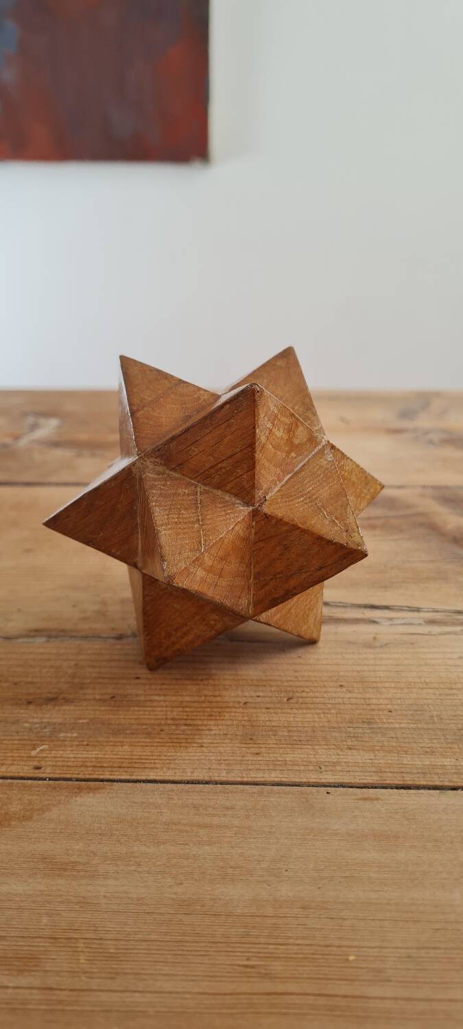 Sacndianve teak paperweight