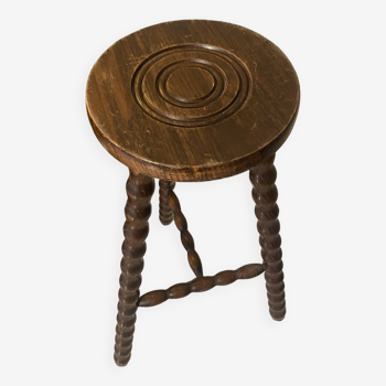High carved wooden stool