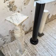 Set of 4 marble columns or pedestals.