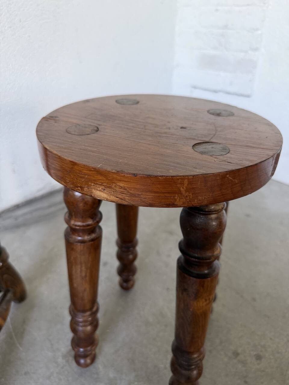 Pair of antique stools with turned legs.