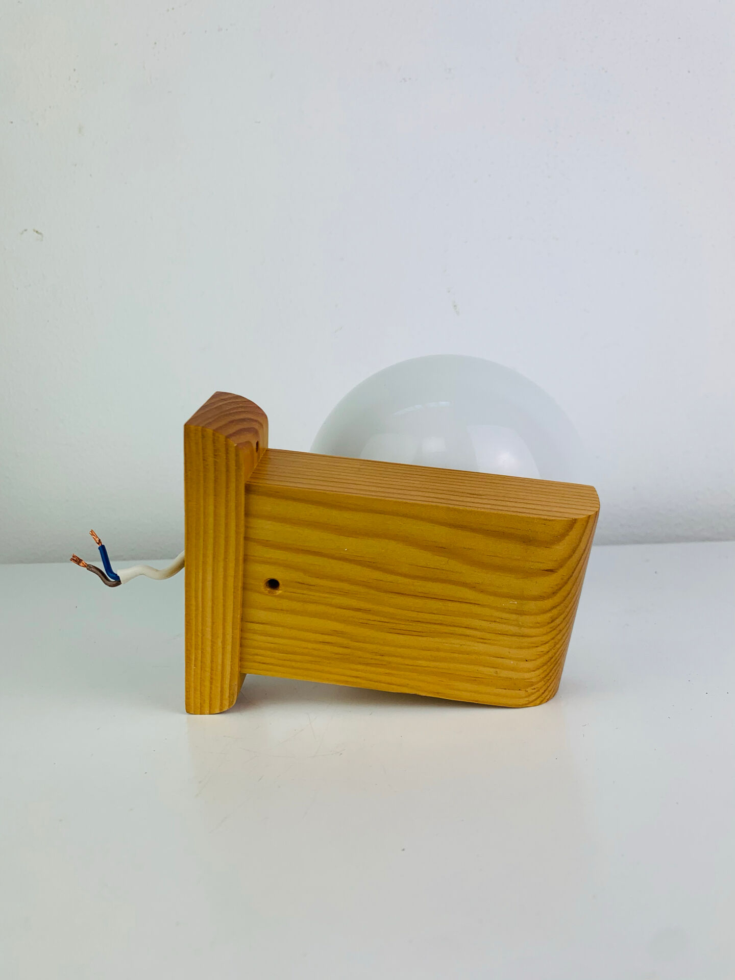 Vintage Tissot opaline globe and pin wall light.