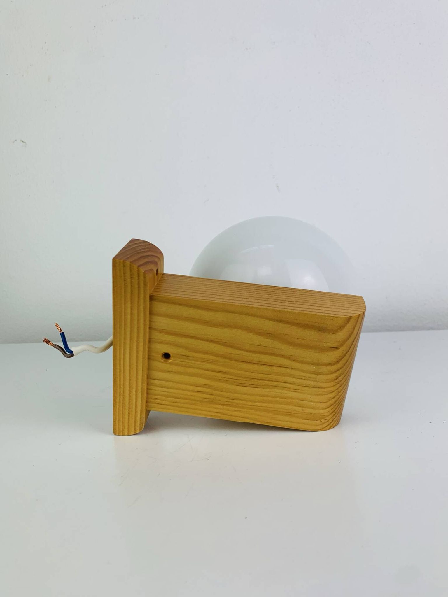 Vintage Tissot opaline globe and pin wall light.