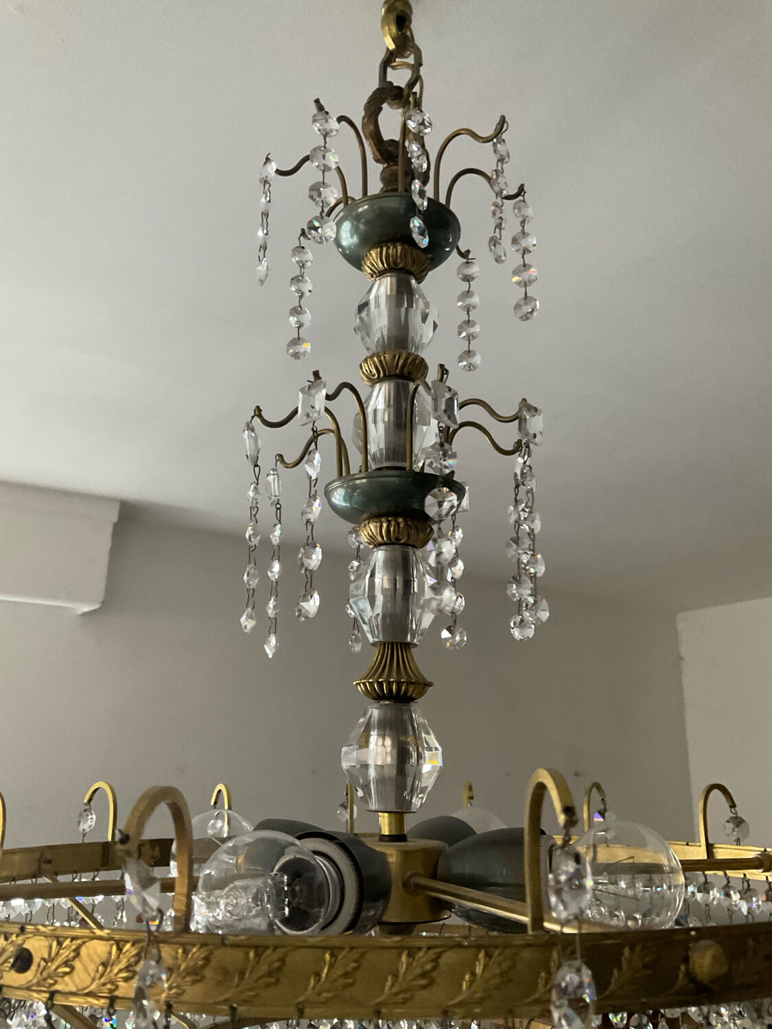 Brass chandelier with crystal pendants