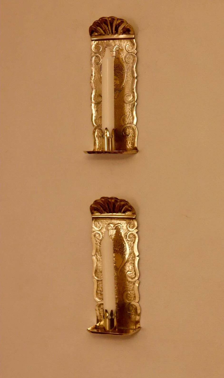 A pair of Swedish brass wall sconces from the mid-century.